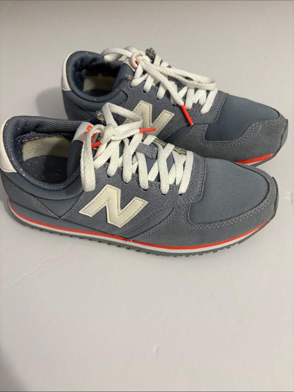 New Balance women Slate Gray, White & Orange Accent Sneakers